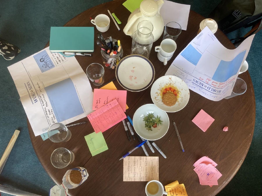 a messy table after a session with post-its and cookie crums